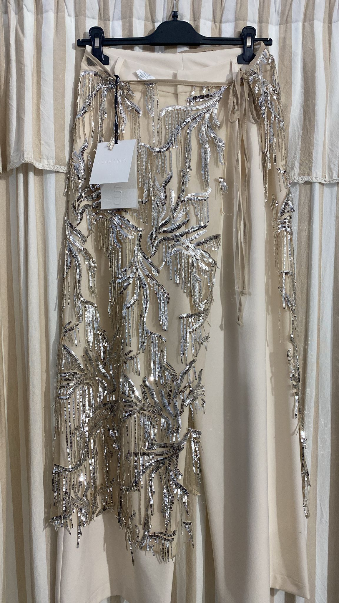 Pareo con paillettes e frange